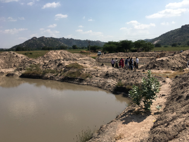 Rain-fed farm pond supplying irrigation in drought stricken region